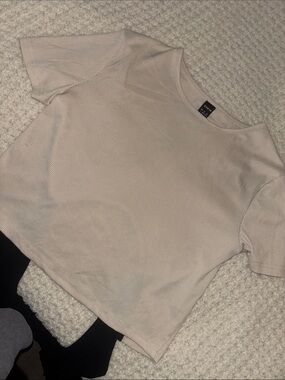 Short Sleeve Ribbed Tee in Light Beige with bow tied back detail